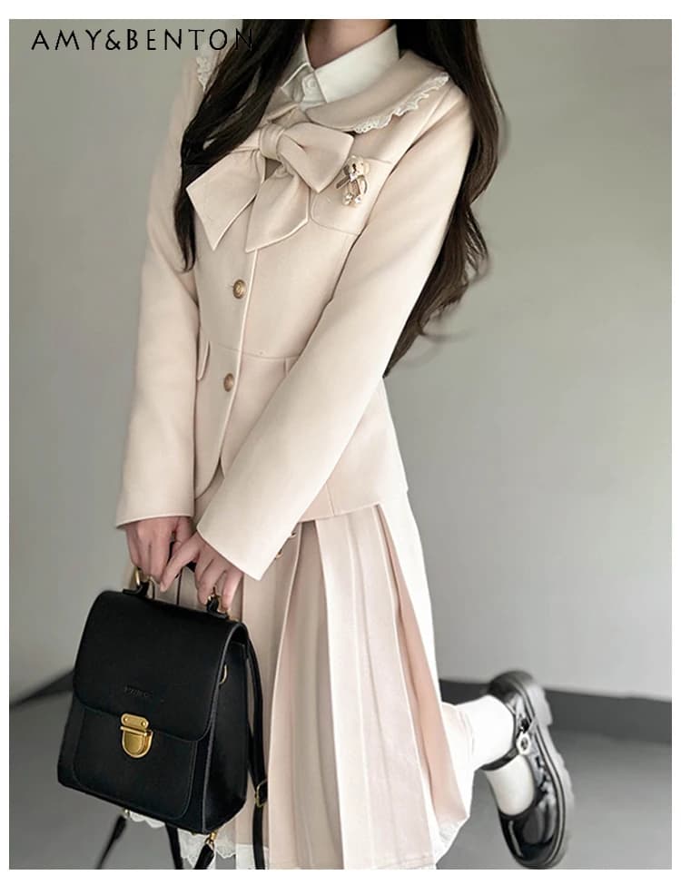 2025 Autunno Inverno Nuova vendita calda Off-White Bow Giacca con risvolto in lana Gonna a vita alta in pizzo Stile college JK Set uniforme