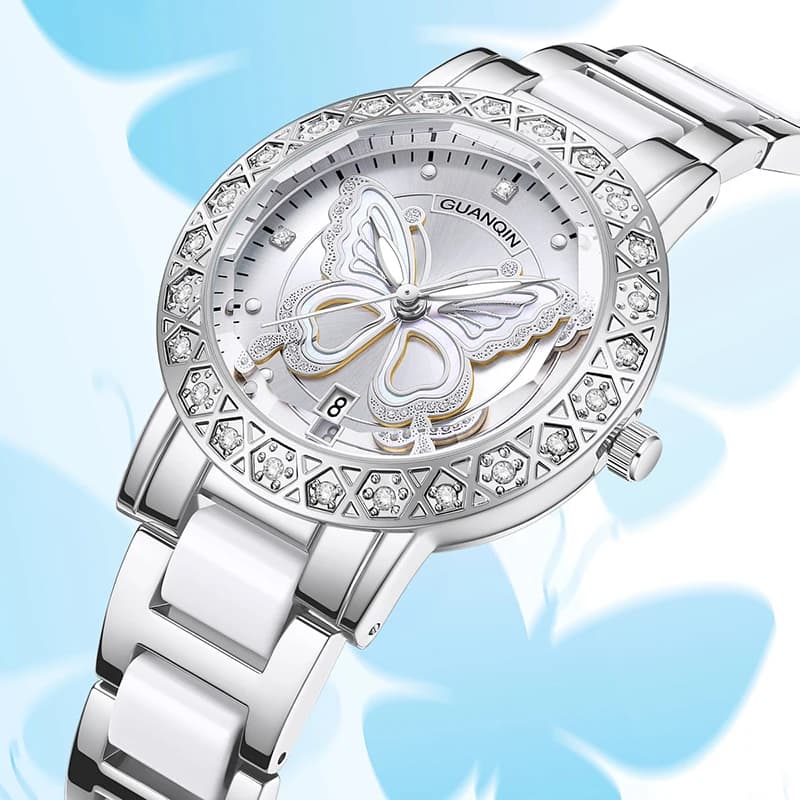 GUANQIN Orologio al quarzo da donna di lusso con motivo a farfalla con lunetta tempestata di strass Cassa in acciaio inossidabile 30M Orologi impermeabili da donna
