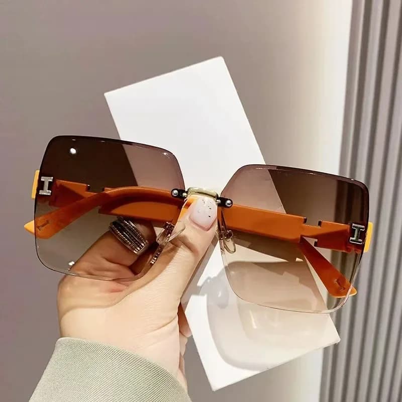 Occhiali da sole da donna senza montatura con montatura grande, adatti per scattare foto, per le occasioni festive e per l'abbigliamento quotidiano, adatti per l'uso quotidiano e per lo street style.