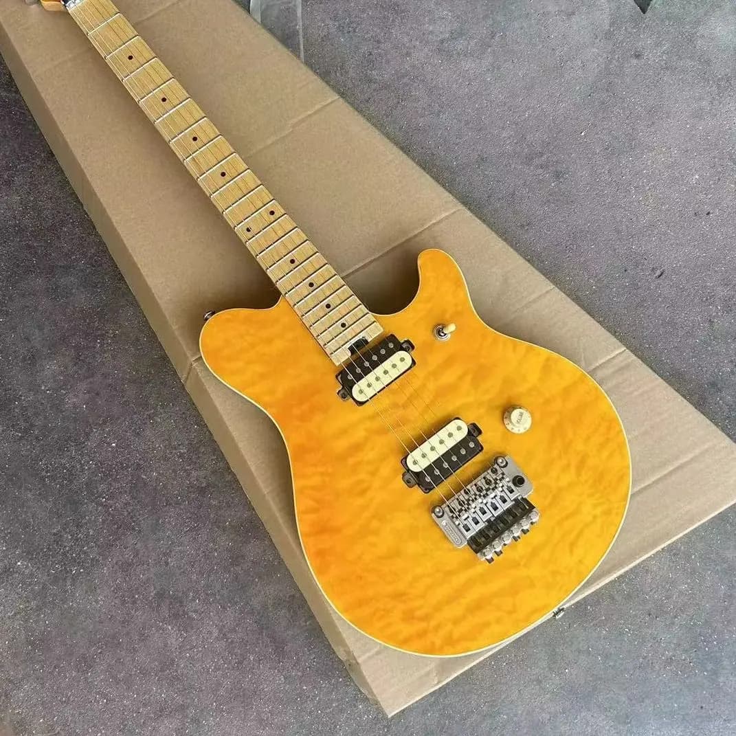 Corpo in tiglio giallo, collo in acero, 6 corde, copertura ondulata, piastra a doppio pendolo, 22 prodotti.