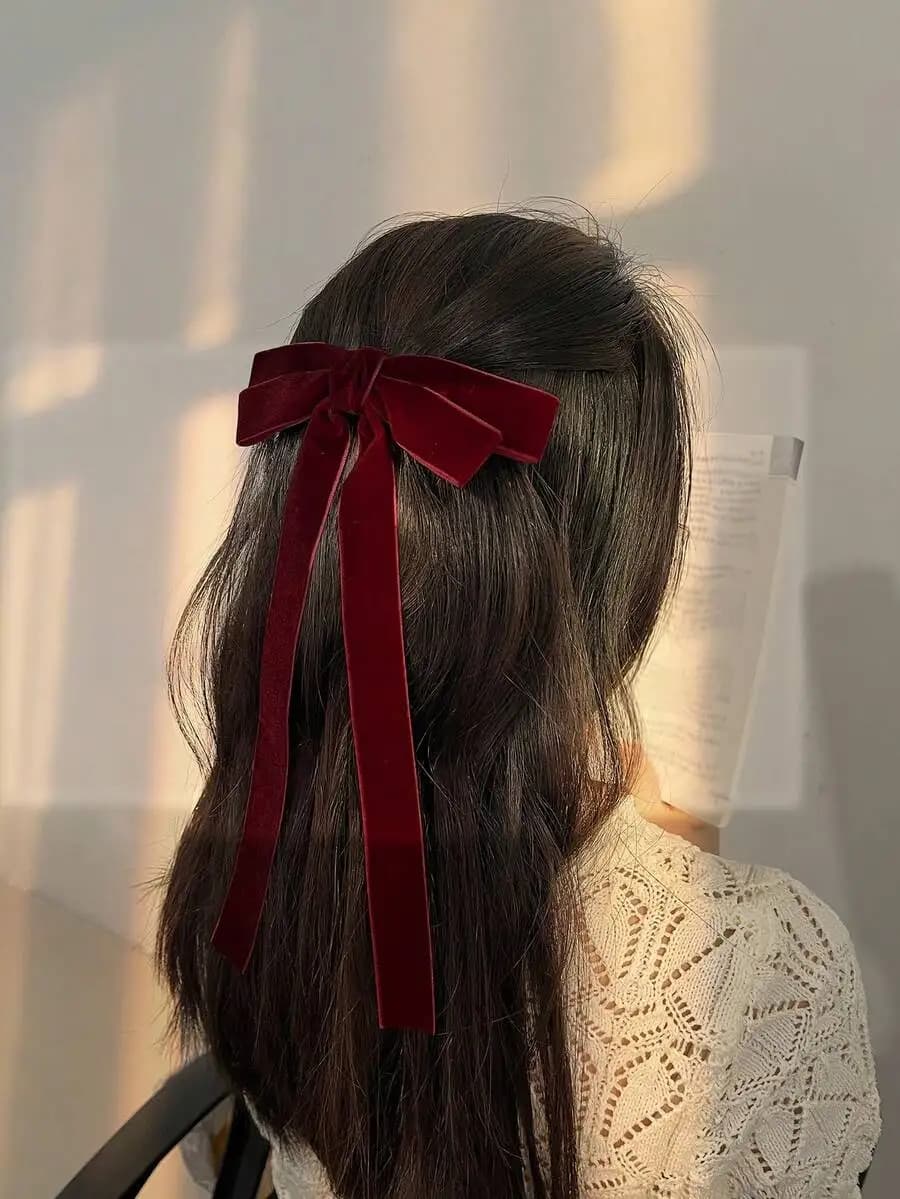 Women's burgundy velvet hair clip with bow knot detail elegant claw style for daily wear winter outfits school college use