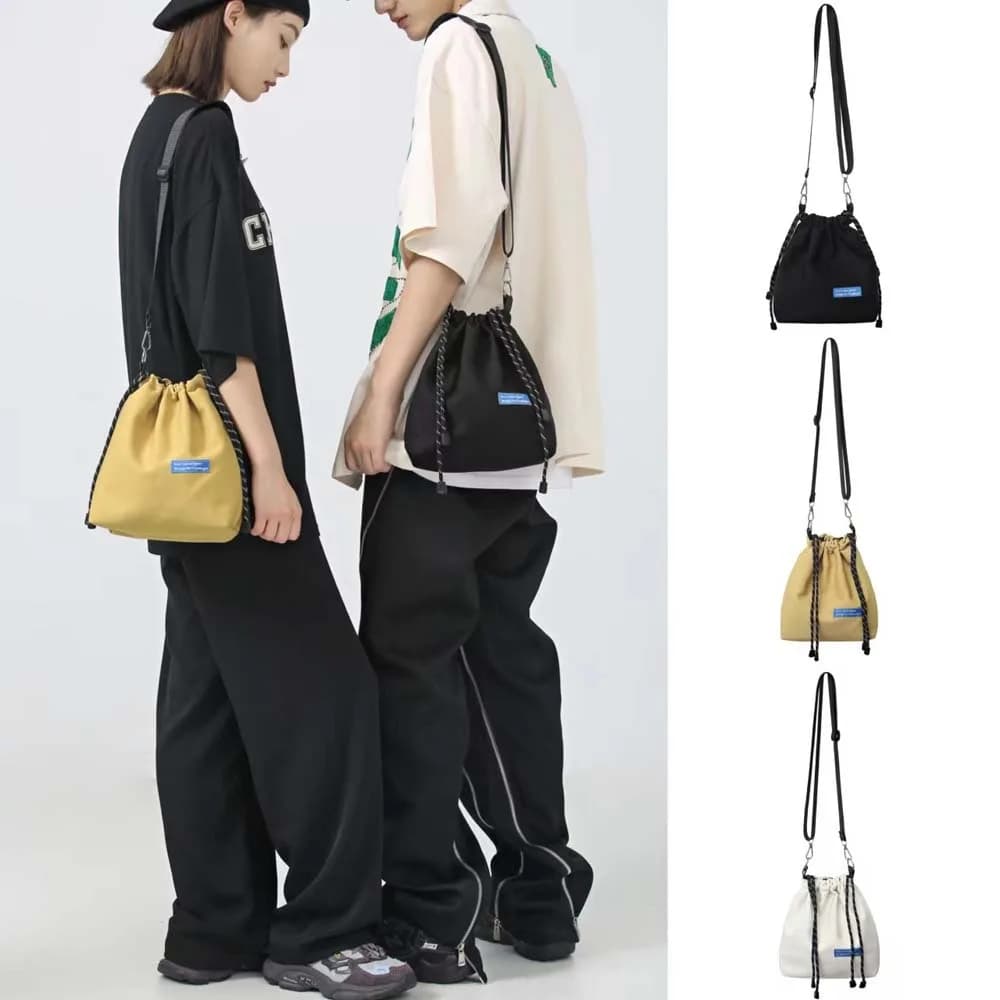 Borsa a secchiello con coulisse in nylon Borsa a tracolla stile coreano regolabile casual Borsa a tracolla portatile da uomo per tutte le partite Uomo Donna