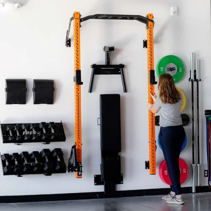 Commercial Multifunction Wall Foldable Power Pro squat rack for home and gym use with multi-grip pull-up bar
