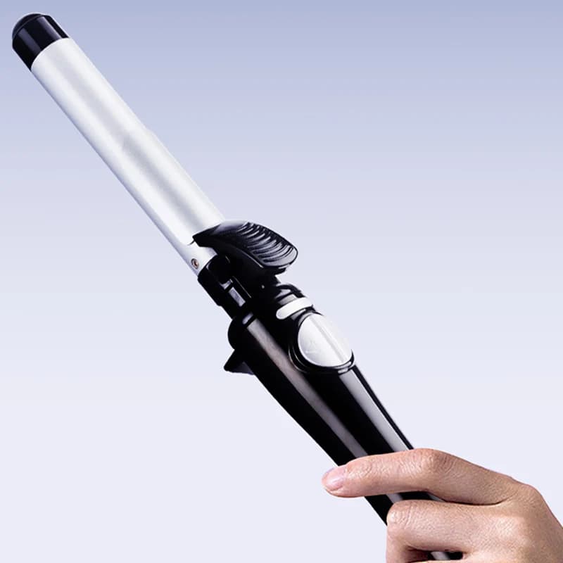 Adjustable temperature electric curler for domestic use with PTC heating and LED display for large wave styling