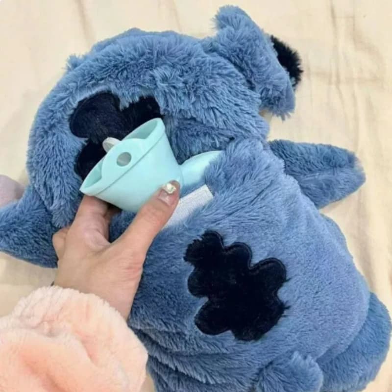 Cute Image of Cartoon Toy Hot Water Bottle Doll Shi Dizai Sleeping with Her Birthday Present.