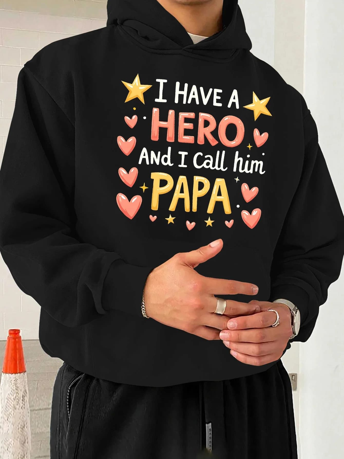I have a hoodie with design characterized by the phrase "I have a hero and call Dad" long with motifs of stars and hearts.