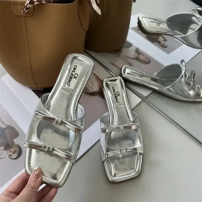Nuove scarpe da spiaggia Open Toe Fashion Double Bowknot Pantofole da donna Pantofole con suola piatta Sandali da donna Plus Size 43 Zapatos