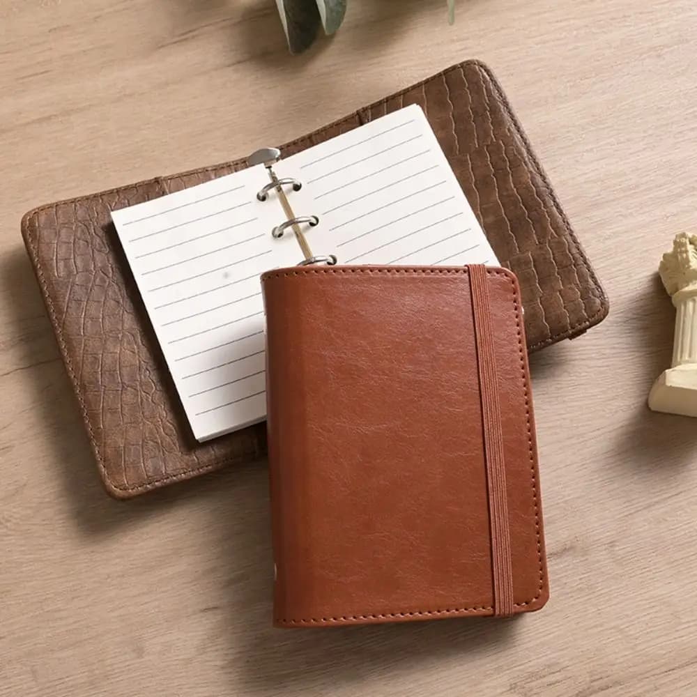 Semplice raccoglitore in pelle A8 Notebook linea vuota 5 fori Mini diario pianificatore Programma portatile Blocco note Studente