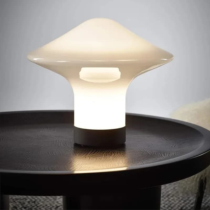 Modern and minimalist gyroscope shaped table lamp recommended by design Trottola creative desk lamp for living room