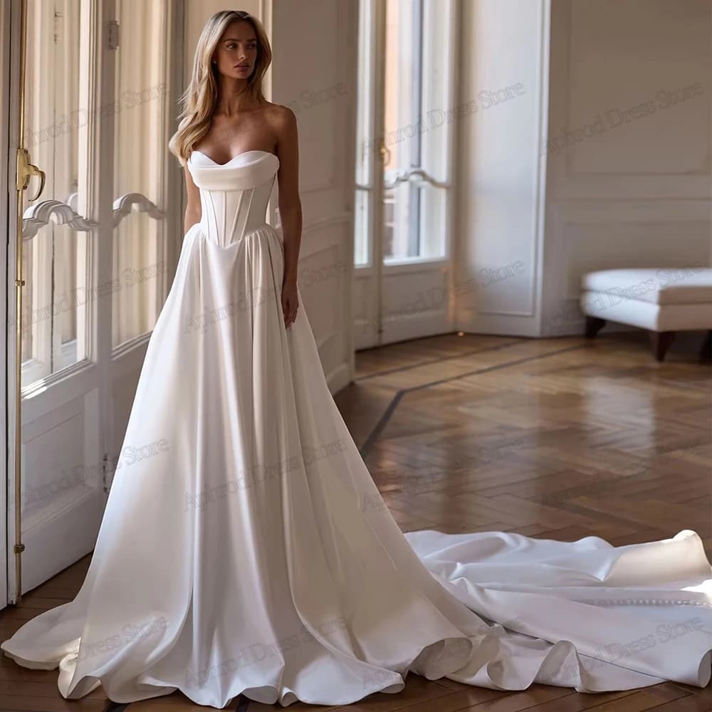 Abiti da sposa graziosi Abiti da sposa semplici in raso Abiti sexy senza spalline senza schienale Abiti con fessura alta Abiti da sposa personalizzati 2026