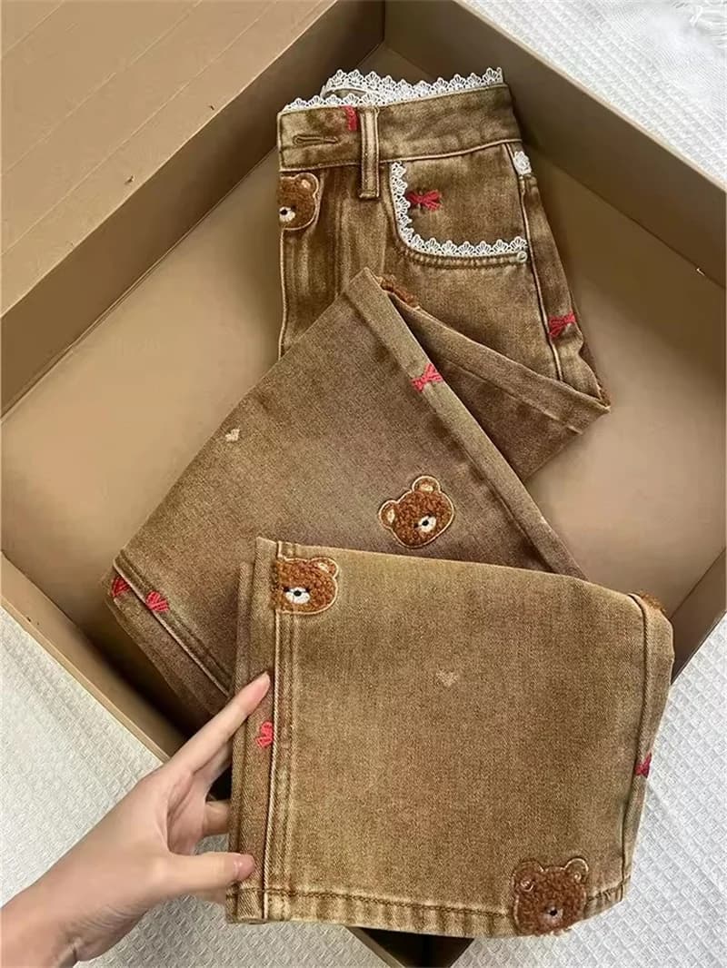 Jeans dritti in pizzo patchwork a vita alta Pantaloni in denim per cani con ricamo primaverile Pantaloni a tubo slim da donna Pista da cowboy da donna