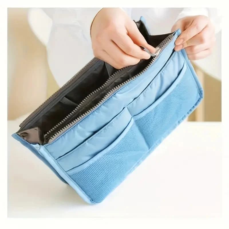 Borsa da toilette da viaggio per uomo e donna. Tessuto Oxford leggero e resistente con tasche con cerniera, lavabile a mano.