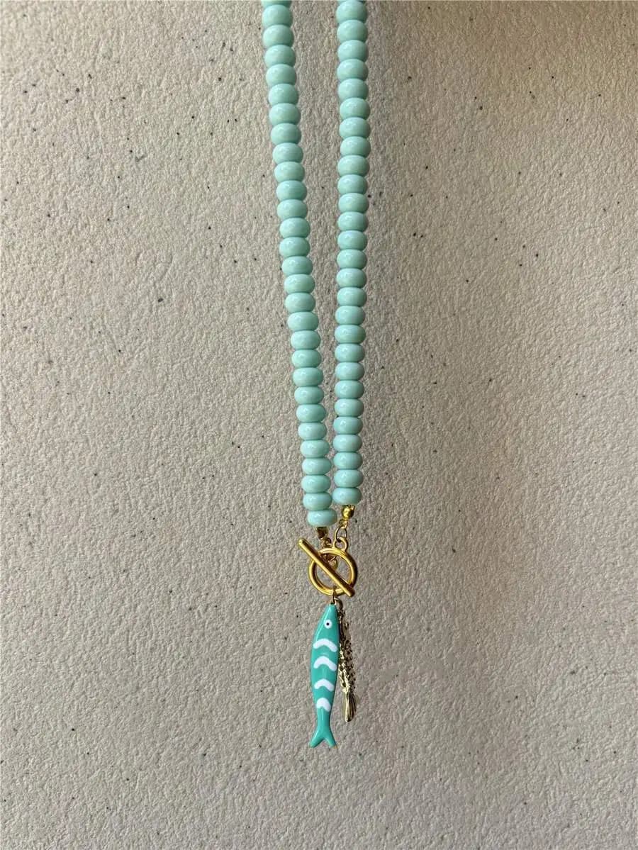 Collana con Ciondolo in Perline Turchesi e Charm a Forma di Pesce per Donne