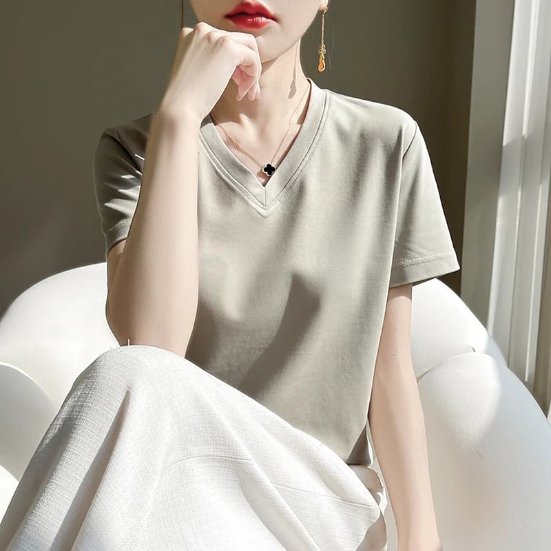 T-shirt estiva a maniche corte in cotone 100% con scollo a V Camicia da donna a mezza manica in cotone mercerizzato allentato Top bianco di fascia alta
