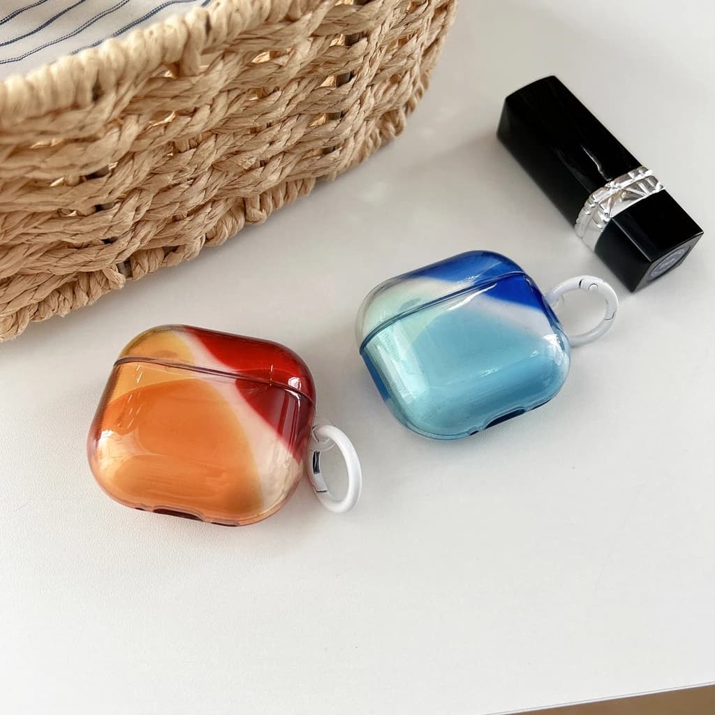 Custodia Protettiva Antiurto Lucida con Sfumatura Bicolore Arancione e Blu con Gancio per Auricolari AirPods 1 o 2 3 4 Pro 2 Pro 3