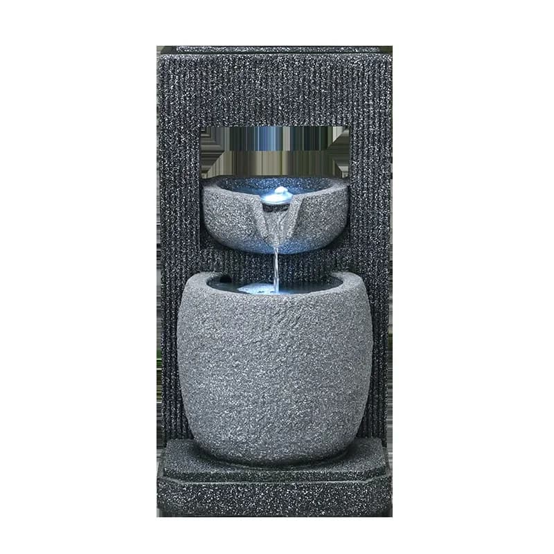 Semplice fontana europea con acqua corrente per rocaille, ruota feng shui, umidificatore, acquario, inaugurazione della casa nel cortile