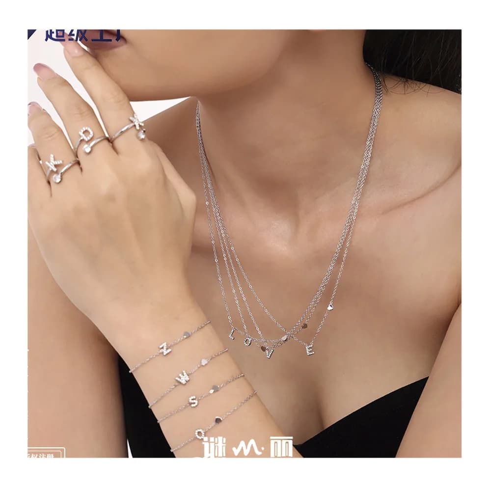 Mystery Titanium Steel Letter Inlaid Zircon Jewelry Set Combination Plated Real Gold Color Retaining Necklace Bracelet Earrings