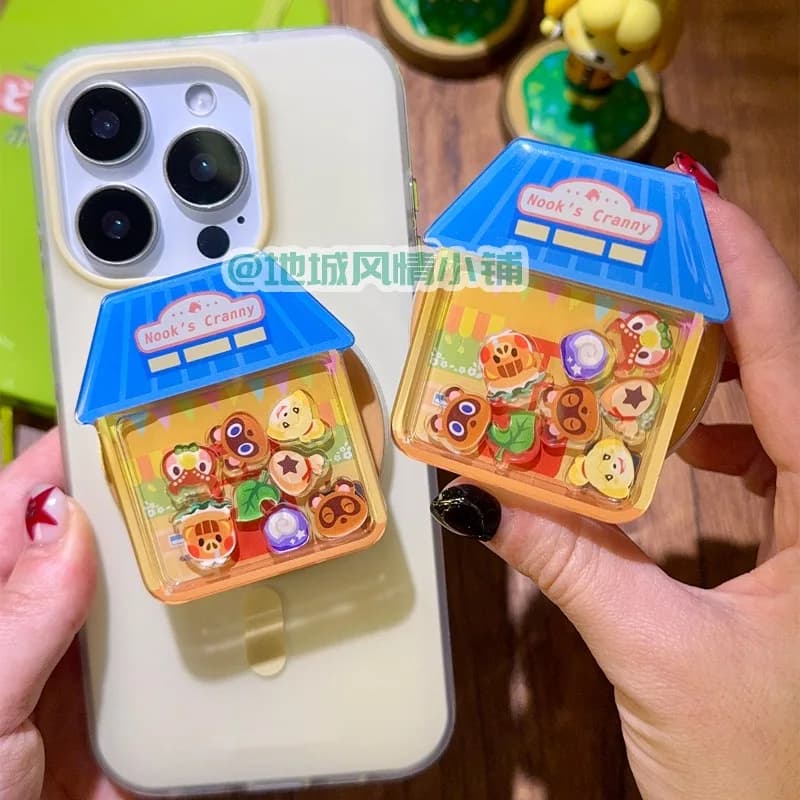 Supporto magnetico per telefono simpatico villaggio di animali con base per cuscino d'aria oscillante, supporto per presa pop per decorazioni da scrivania anime, regalo in magazzino