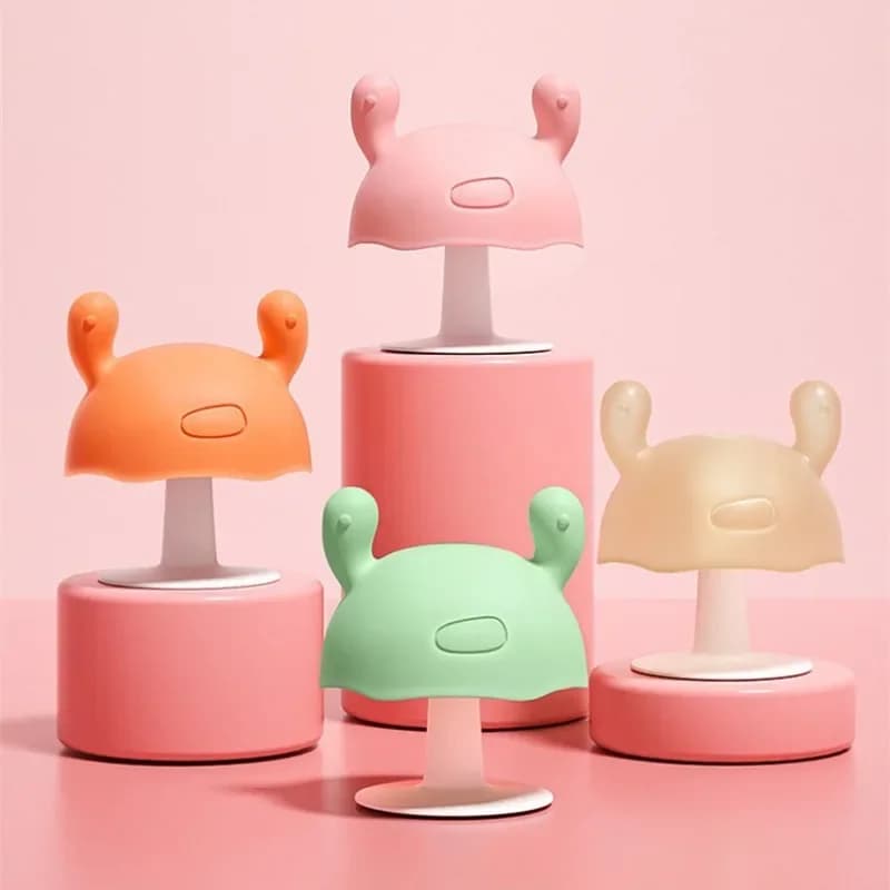 Massaggiagengive per bambini Q Elastico in morbido silicone a forma di rana può essere assortito sul desktop Giocattolo per massaggiagengive in silicone per la cura dei denti del bambino