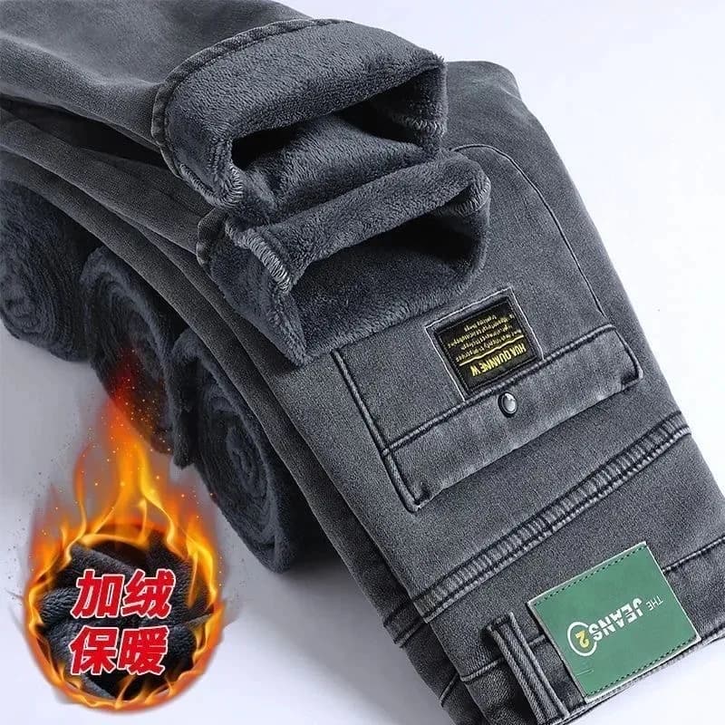 Nuovo colore solido alla moda invernale con pile spesso e jeans elastici a gamba dritta caldi per jeans sportivi casual di fascia alta da uomo