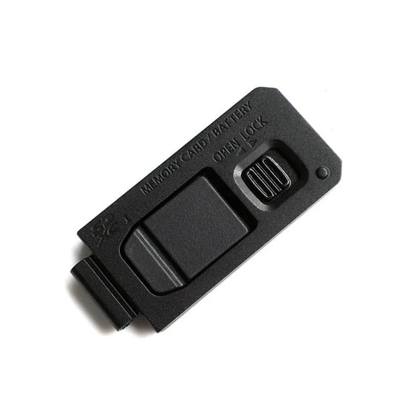 Nuove parti di riparazione della copertura dello sportello della batteria per la macchina fotografica digitale di Panasonic DMC-ZS60 ZS60 ZS70 TZ80 TZ90
