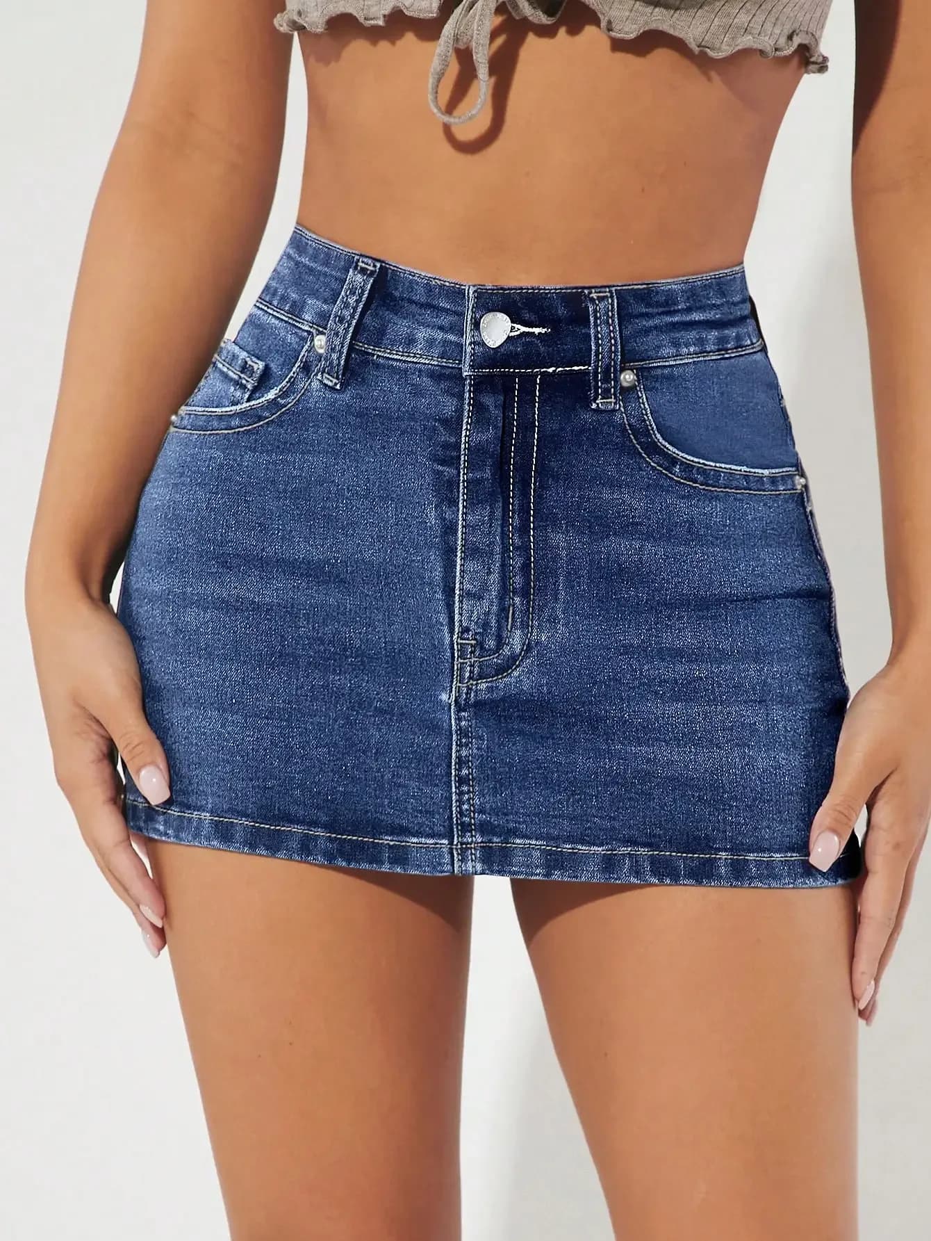 Minigonna in denim lavato a vita alta da donna con tasche frontali