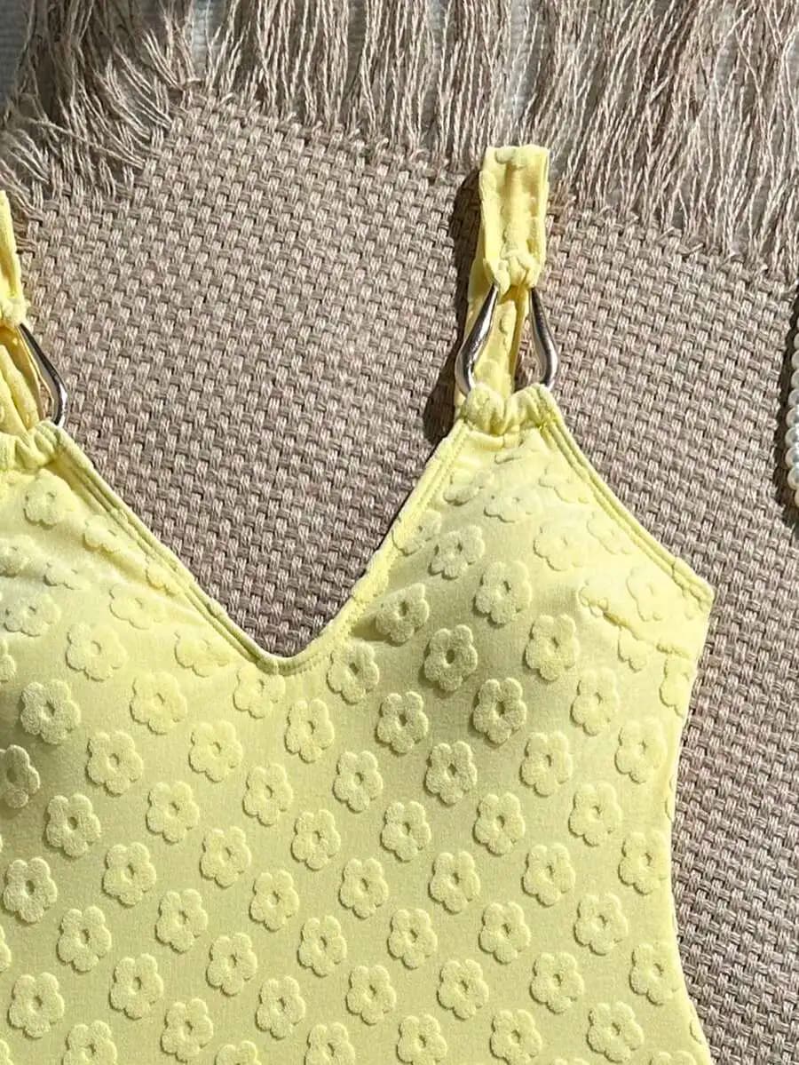 Costume da bagno intero da donna con scollo a V in jacquard floreale giallo e decorazione con cinturino in metallo