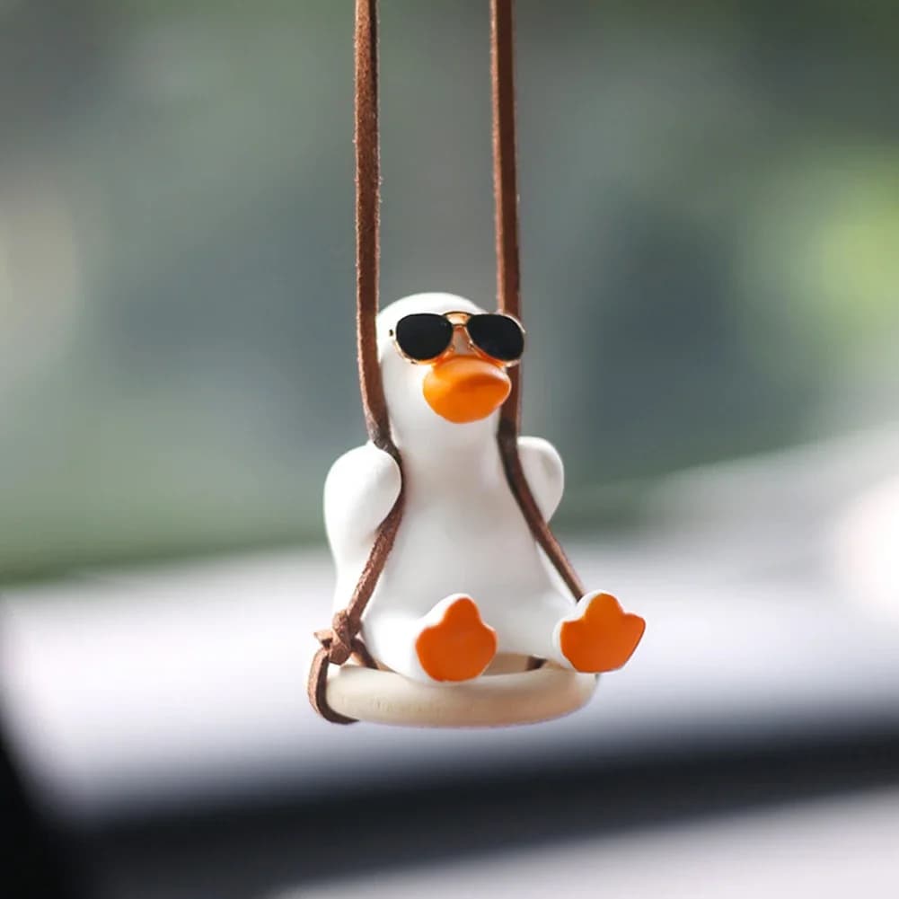 Anatra altalena bianca fredda in gesso con occhiali da sole Decorazioni per automobili Ornamenti per specchietti retrovisori per auto Decorazione automatica per anatra creativa