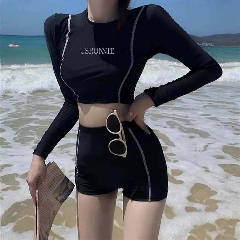 Two-piece black sports swimsuit with short sleeve top and high waist skirt, modest beach costume, swimming pool and workout