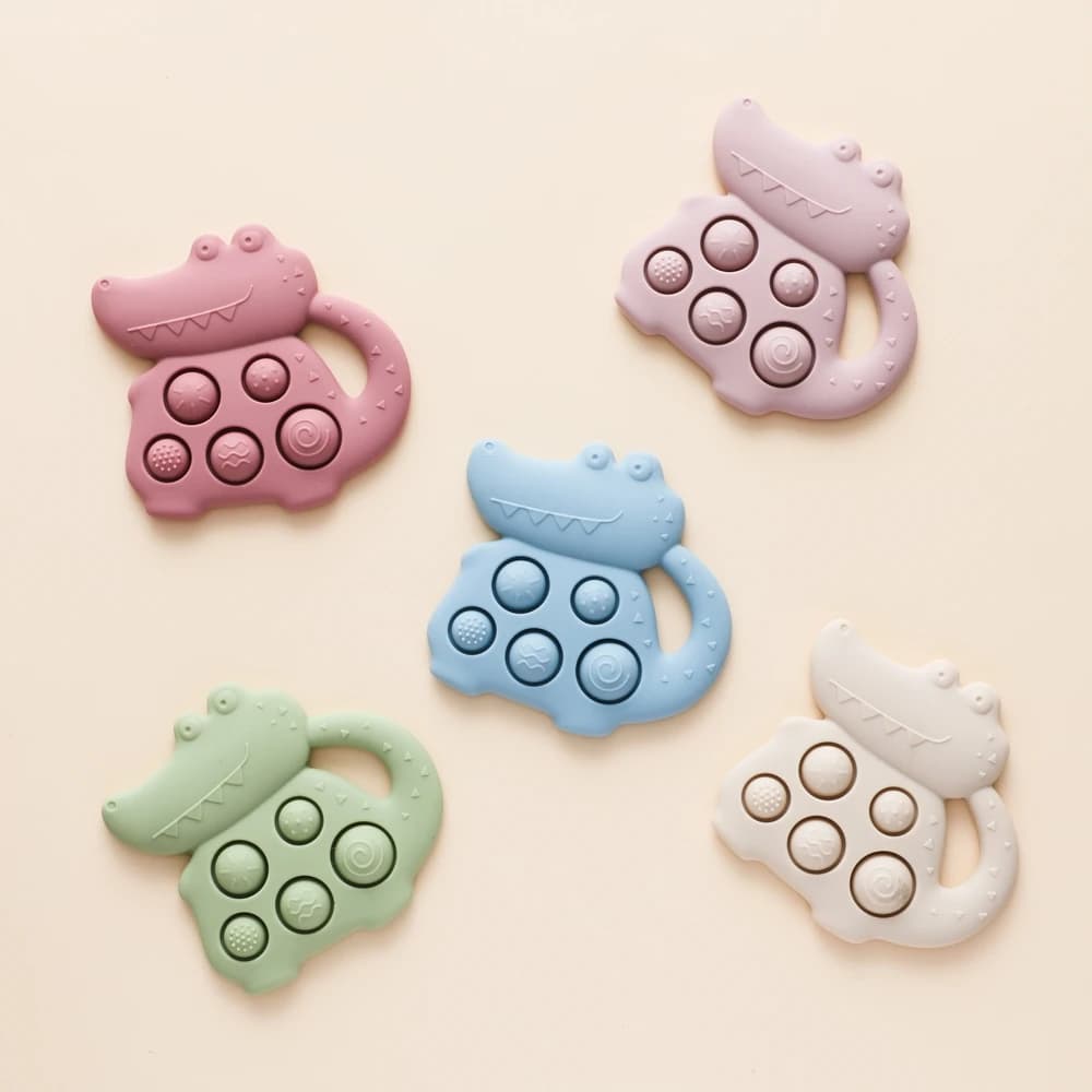 Giocattoli per bambini in silicone Dinosauro Fidget 0-12 mesi Giocattoli Giocattoli per la dentizione del bambino Giocattoli sensoriali Campana a mano in silicone Giocattoli per massaggiagengive in silicone