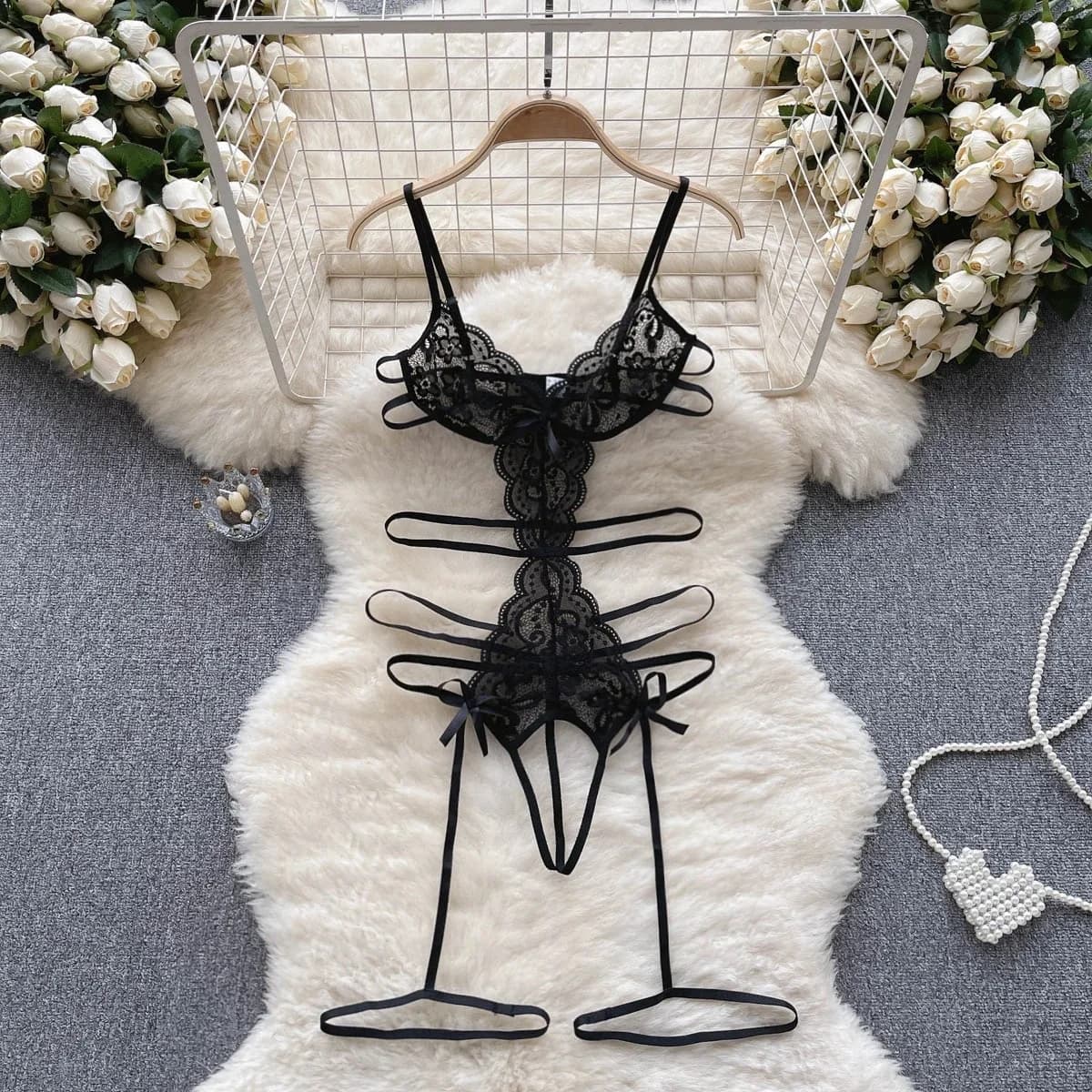 Tuta con cinturino impiombato con fiocco in pizzo Sexy trasparente da donna in pizzo nero scava fuori la tuta di Lingerie erotica Shapewear senza schienale