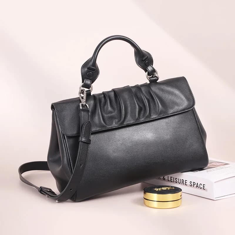 2026 Nuove borse di design coreano di lusso Borsa quadrata pieghettata Borsa a tracolla versatile Borsa a tracolla in pelle conciata al vegetale di fascia alta
