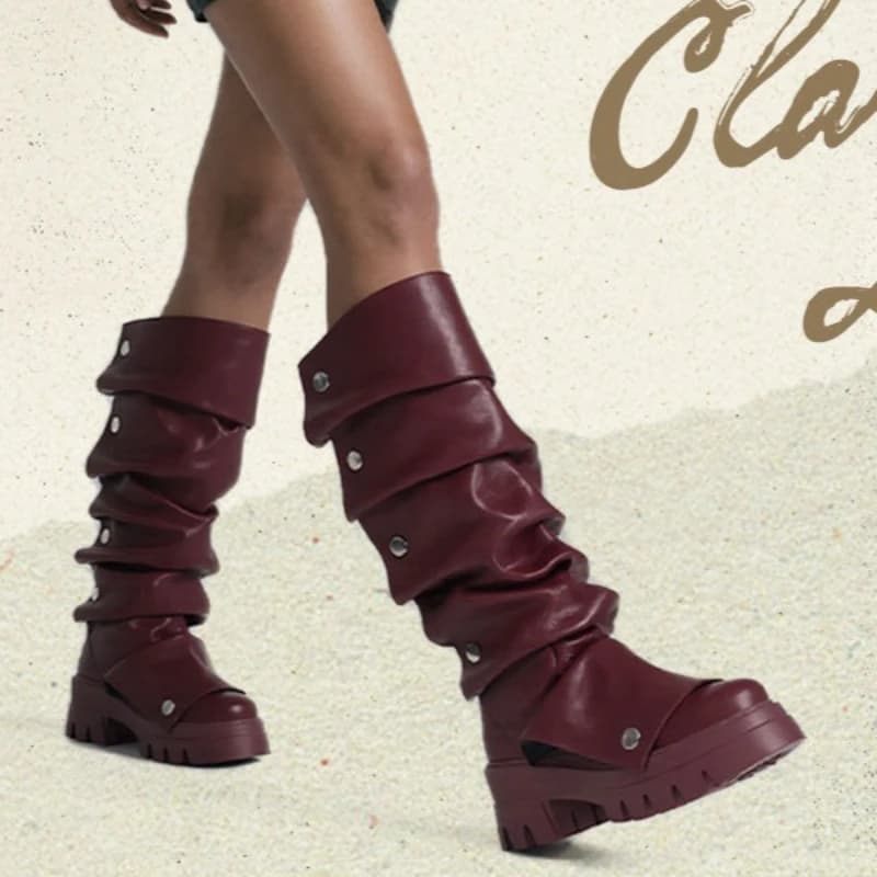 Stivali al ginocchio da donna in stile punk europeo e americano con suola spessa in spugna e manica plissettata, ideali per abbinare con pantaloni casual.