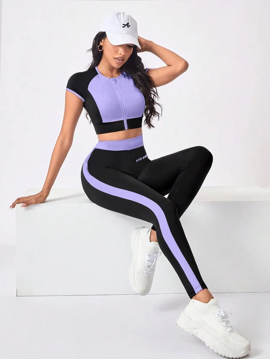 Set sportivo da donna composto da 2 pezzi: top corto con cerniera a contrasto e leggings a vita alta