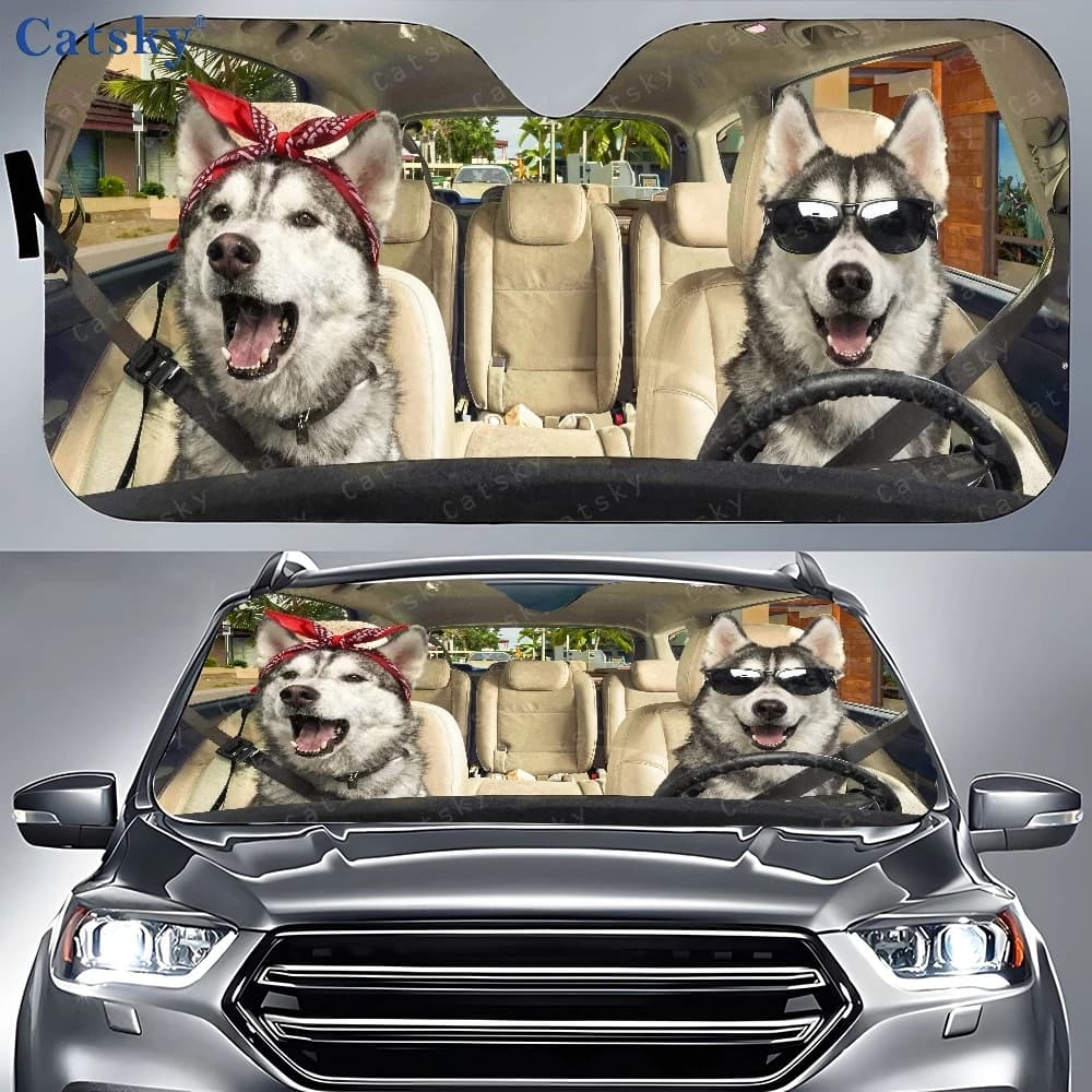 Car parasol with two husky dogs sitting in the back seat, front window sunshade, car sun cover