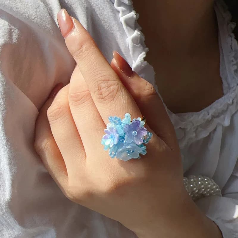 Ring with bunch of flowers of hydrangea and mughetto with colored beads, sweet spring jewelry for women's holidays