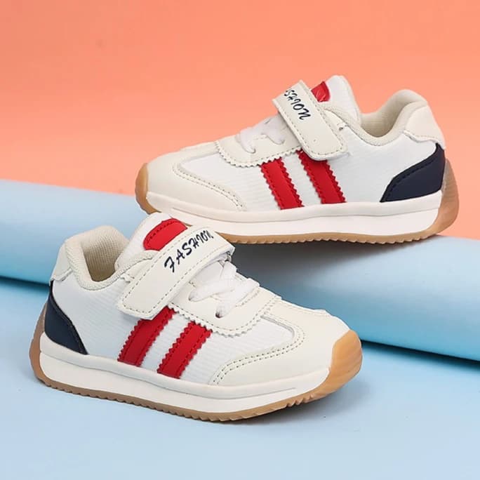 Scarpe da ginnastica alla moda per bambini Ragazzi Ragazze Strisce Scarpe sportive Sneaker in pelle per bambini Scarpe da ginnastica casual antiscivolo Design con cinturino in velcro