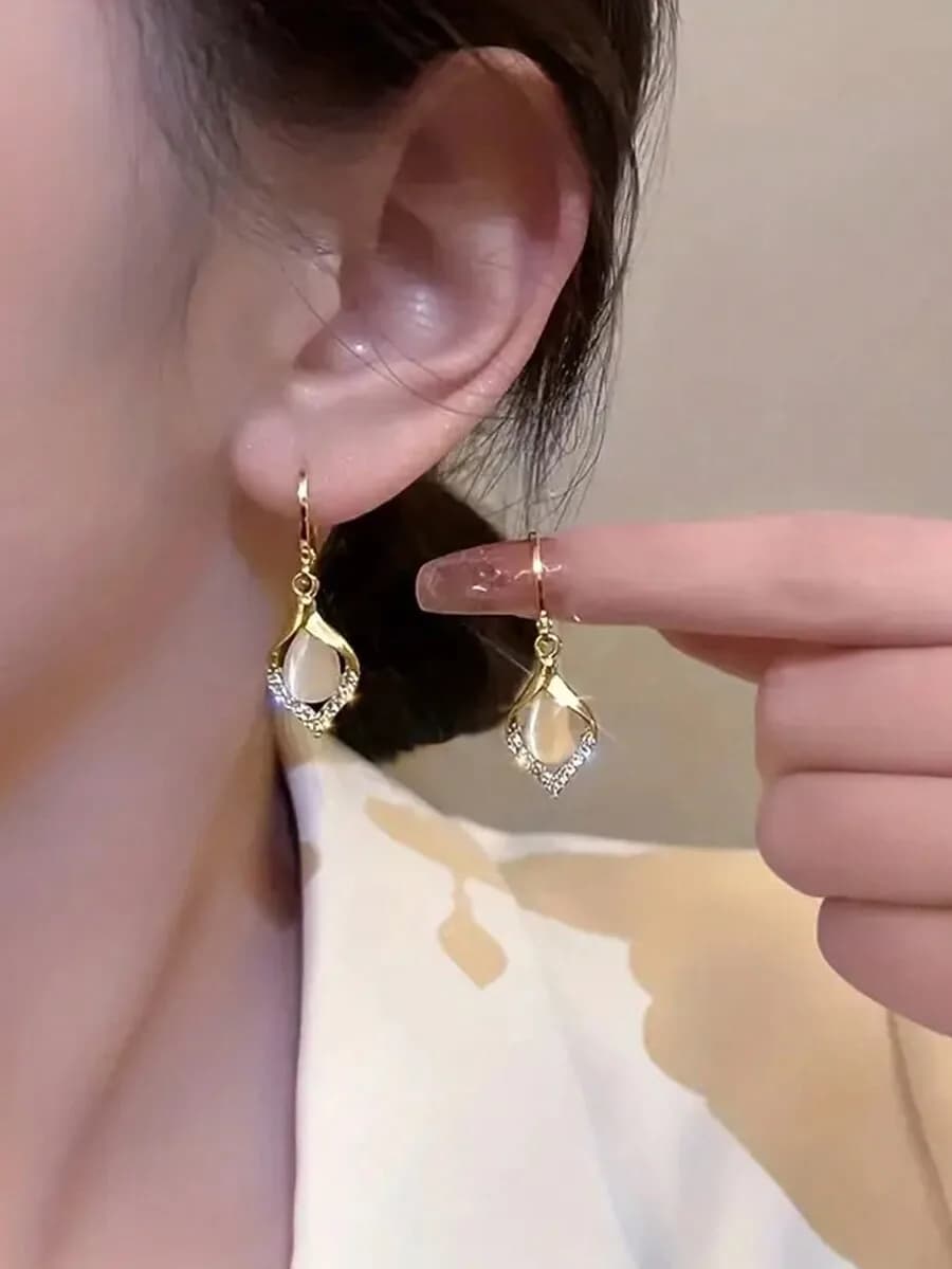 Exquisite opal earrings for women featuring elegant teardrop gemstone design perfect as a refined jewelry gift