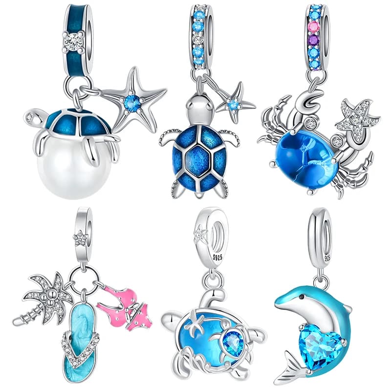 Ciondoli pendenti in argento sterling 925 a tema animali marini: tartaruga, granchio, delfino, stella marina, infradito. Perline compatibili con bracciali charm. Regalo di gioielleria.