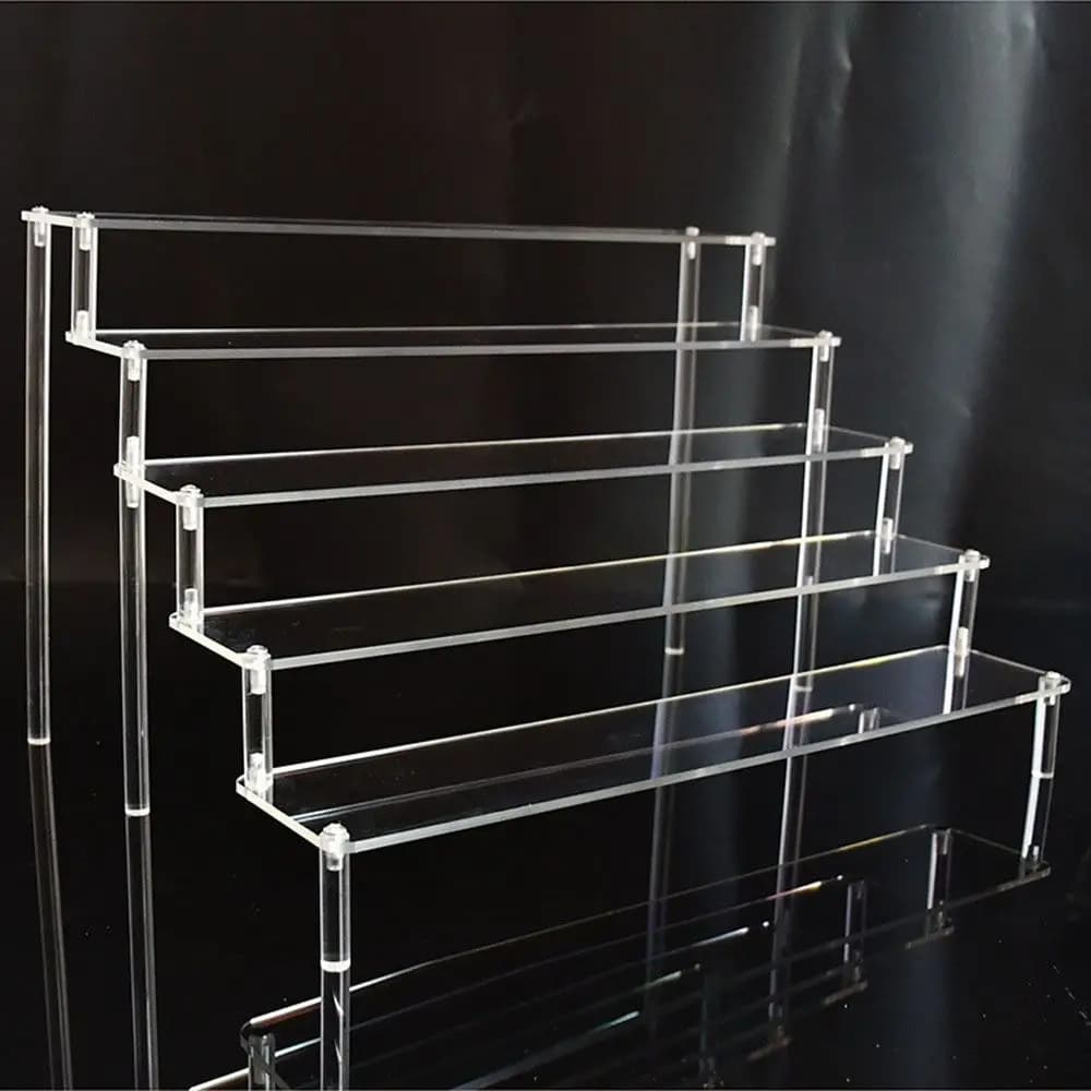 Espositore in acrilico a 1-4 livelli, resistente, per cupcake, profumi, bambole, scatole trasparenti trapezoidali, scaffale portaoggetti.