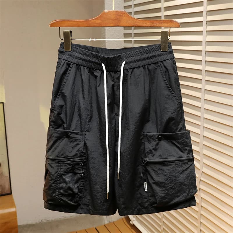 Pantaloncini casual larghi da uomo nuovi estivi Pantaloncini cargo da esterno elasticizzati morbidi in cotone Pantaloni corti in vita elastica multitasche sottili