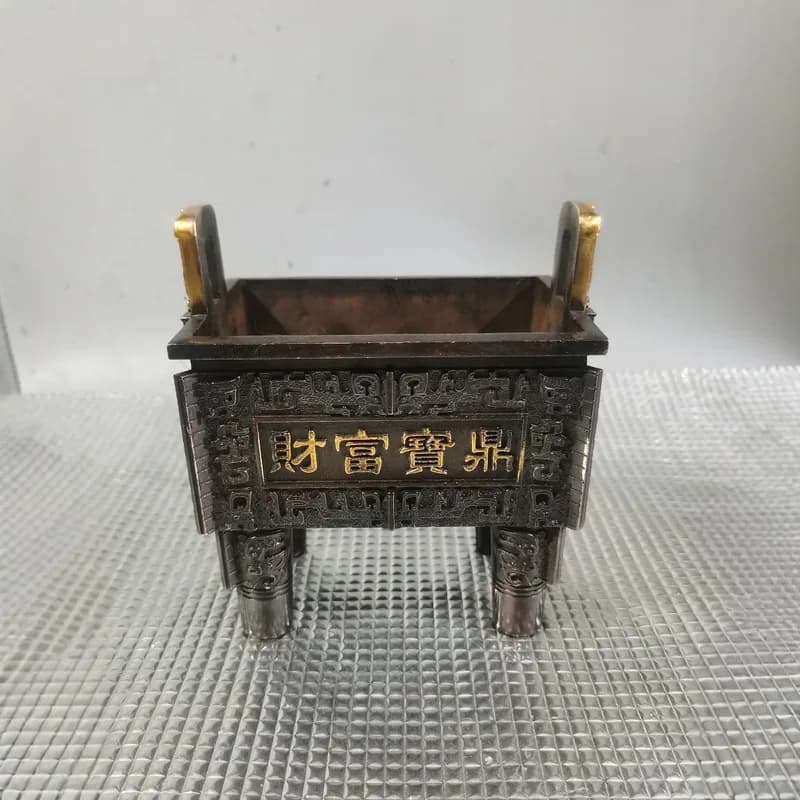 Gilt copper wealth treasure tripod ornament，Bronze Triangular Vase - A Timeless Ornament for Office Opening Gifts and Home Decor