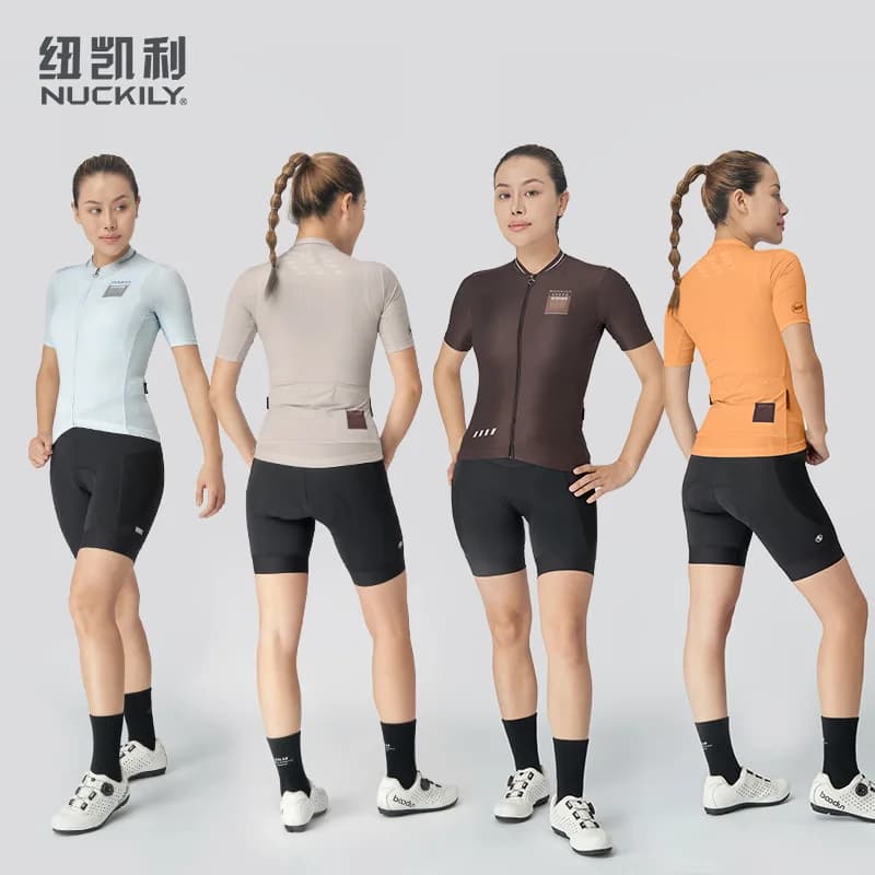 NUCKILY Completo da ciclismo da donna 2 pezzi, maglia a maniche corte + pantaloncini imbottiti 3D, ad asciugatura rapida, traspirante, antiscivolo, per bici da strada e MTB