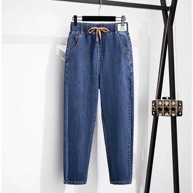 Autunno e inverno nuovi jeans taglie forti 7XL 6XL pantaloni in denim larghi casual slim con tasca da donna elastici a vita alta.