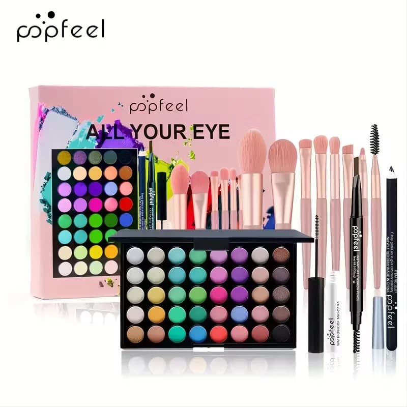 Un kit trucco natalizio con palette di ombretti da 40 colori, che include mascara, pennelli per ombretto, eyeliner e matite per sopracciglia, perfetto.