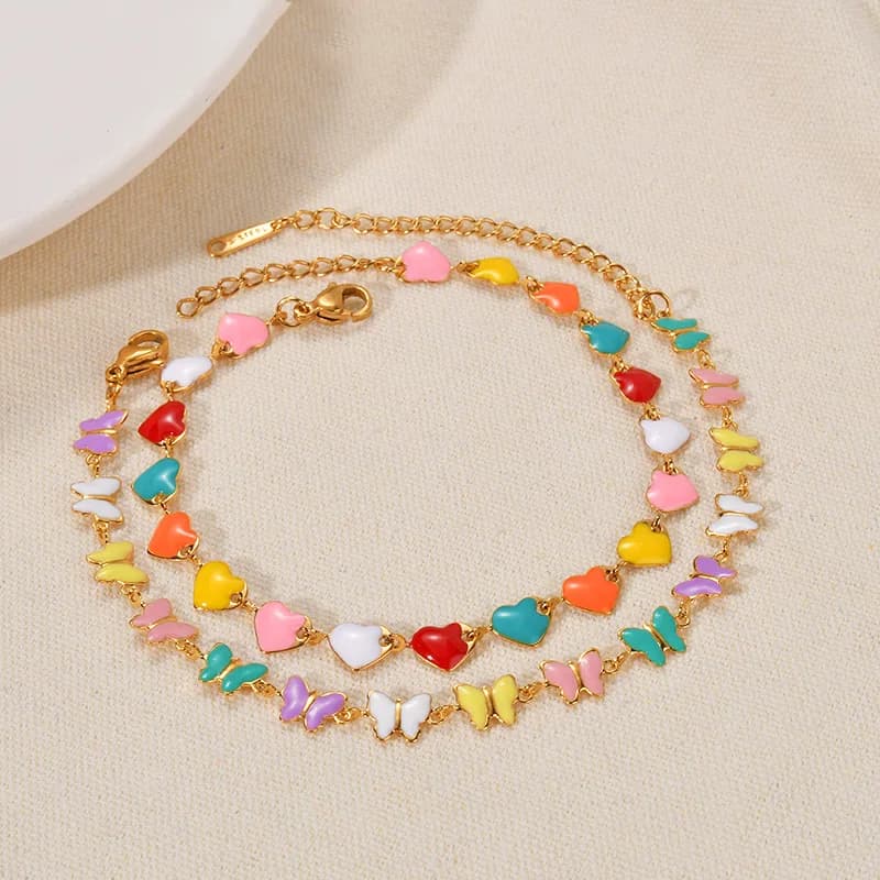 Bracciale Kissmoon in Acciaio Inossidabile con Cuori e Farfalle Smaltati Colorati, Gioiello Trendy per Donne, Ideale per Spiaggia, Matrimoni e Feste