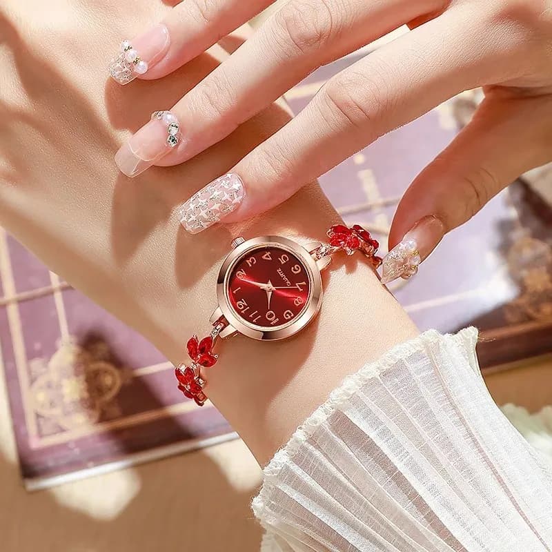 Cassa rotonda in lega con numeri arabi quadrante classico Bracciale alla moda tempestato di diamanti a forma di foglia Orologi al quarzo da donna eleganti Reloj