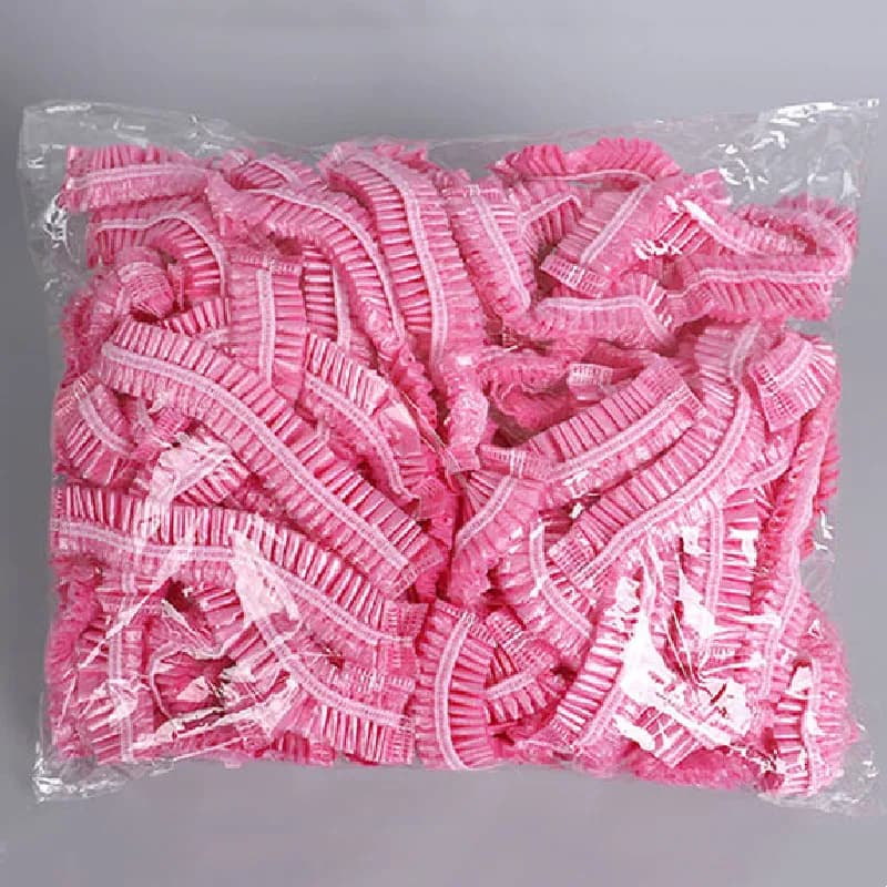 100 pcs/set Use And Drop Shower Heads Plastic Raincoat Pink Spa Spa Salon Hotel Hair Tincture Women's Elastic Hair Cap Bathroom