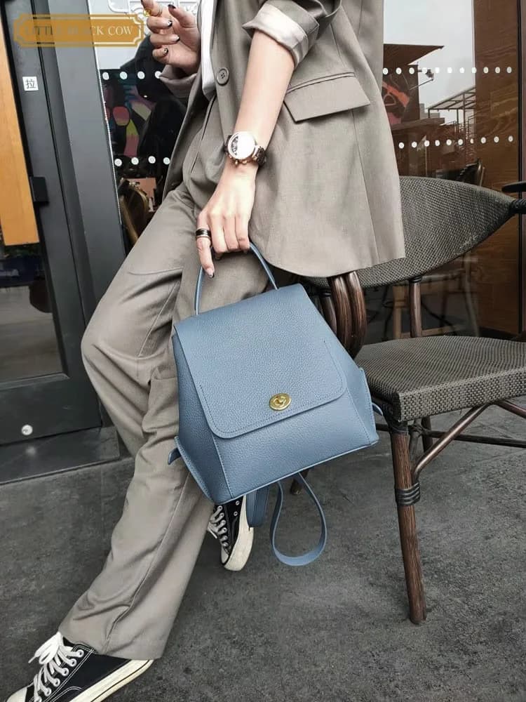 Zaino in vera pelle da donna moda casual borsa con patta con fibbia vintage High Street tinta unita zaini versatili vintage da donna