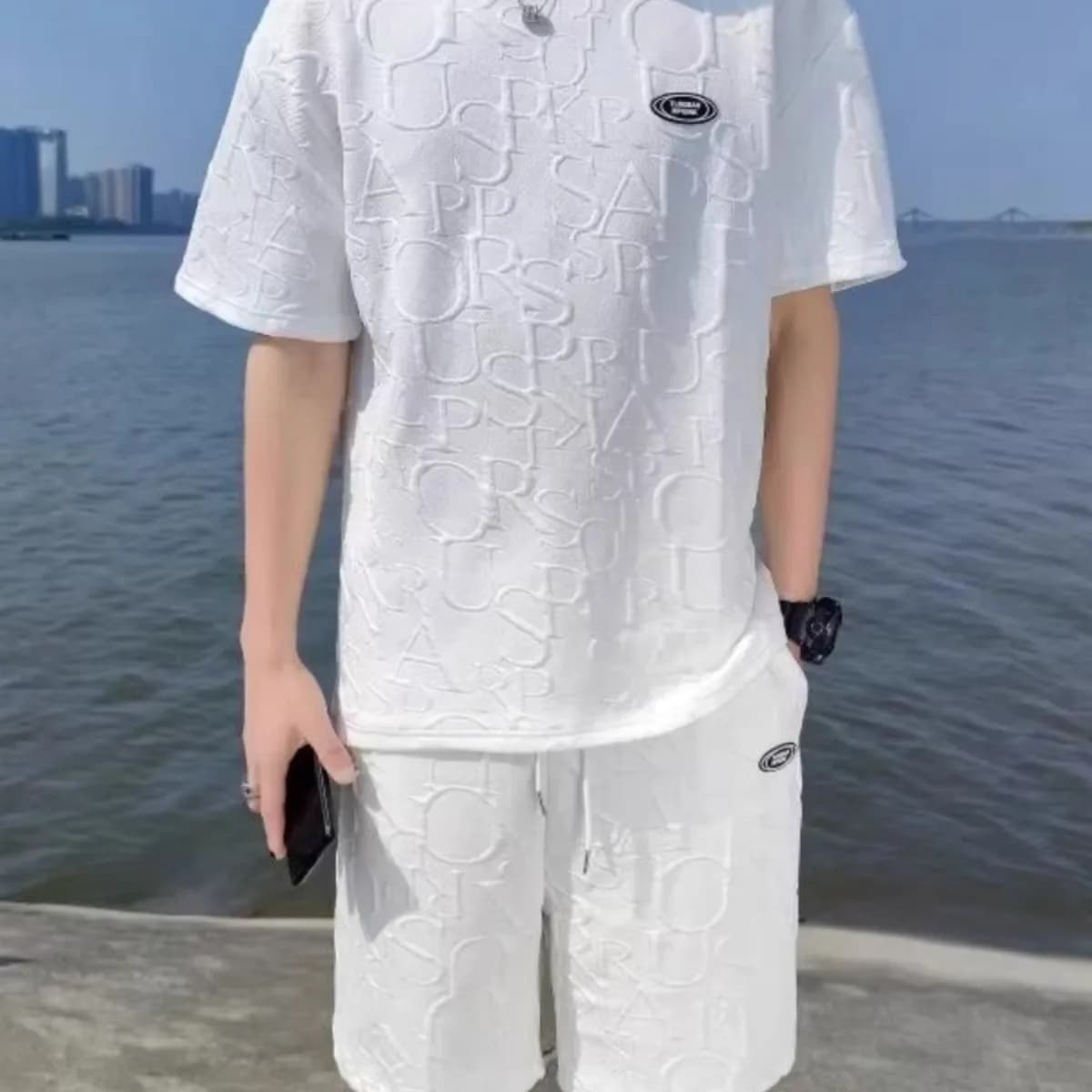 Abbigliamento sportivo estivo da uomo, maniche corte, pantaloncini sottili, casual, alla moda, stile giovanile, set di t-shirt e pantaloncini.